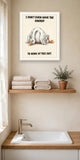 The same print shown hanging in a bathroom — frame for display only, not included