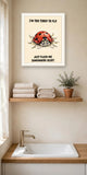 The same print shown hanging in a bathroom — frame for display only, not included