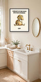 The same print shown hanging in a bathroom — frame for display only, not included