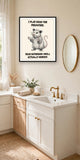 The same print shown hanging in a bathroom — frame for display only, not included