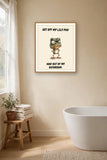 The same print shown hanging in a bathroom — frame for display only, not included