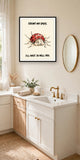 The same print shown hanging in a bathroom — frame for display only, not included