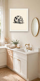 The same wordless print shown hanging on a wall — frame for display only, not included