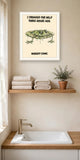 The same print shown hanging in a bathroom — frame for display only, not included