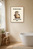 The same print shown hanging in a bathroom — frame for display only, not included