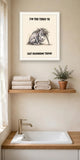The same print shown hanging in a bathroom — frame for display only, not included