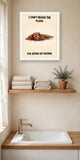The same print shown hanging in a bathroom — frame for display only, not included