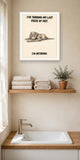 The same print shown hanging in a bathroom — frame for display only, not included