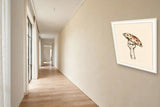 The same wordless print shown hanging on a wall — frame for display only, not included