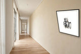 The same wordless print shown hanging on a wall — frame for display only, not included