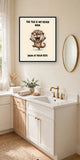 The same print shown hanging in a bathroom — frame for display only, not included