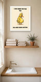 The same print shown hanging in a bathroom — frame for display only, not included