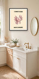 The same print shown hanging in a bathroom — frame for display only, not included