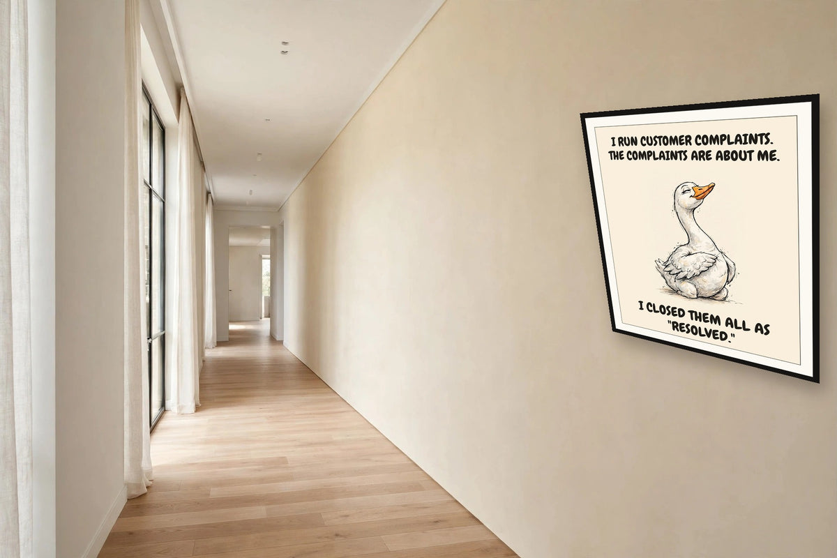 The same print shown hanging in an office — frame for display only, not included