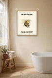 The same print shown hanging in a bathroom — frame for display only, not included