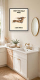 The same print shown hanging in a bathroom — frame for display only, not included