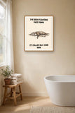 The same print shown hanging in a bathroom — frame for display only, not included